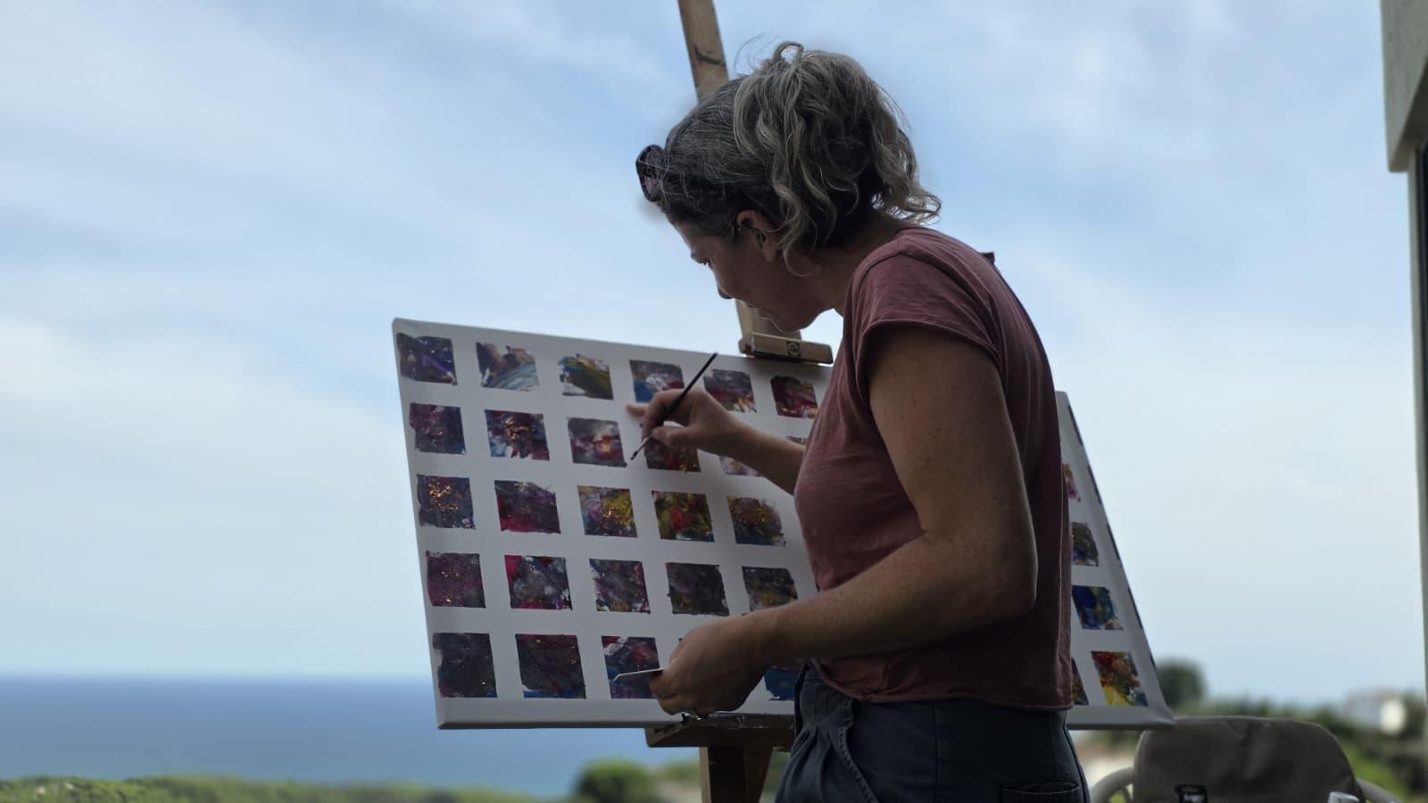 Camille Guter painting outdoors